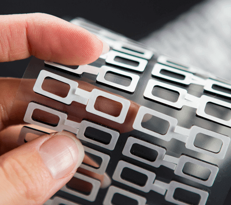 rotary die cutting with pull tabs
