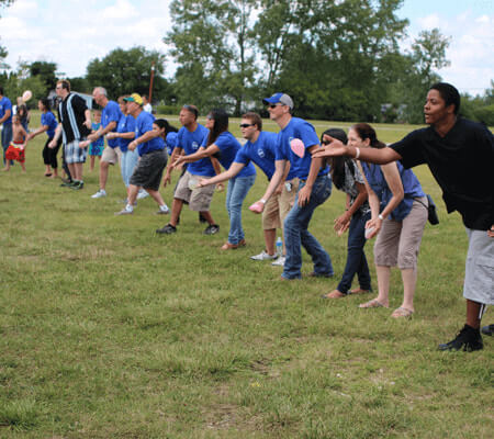 Water balloon toss at the Marian Indianapolis Summer Employee Picnic